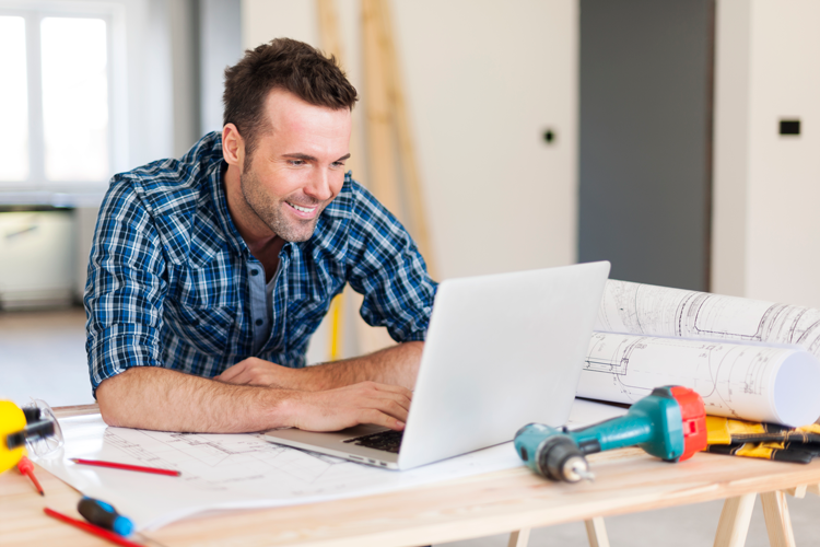 Contractor inspecting property